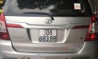 Toyota Innova E  2015 - Gia đình bán ô tô Toyota Innova E năm 2015, màu bạc  