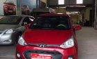 Hyundai Grand i10 AT 2016 - Cần bán lại xe Hyundai Grand i10 AT sản xuất 2016, màu đỏ, xe nhập  