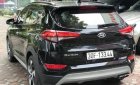 Hyundai Tucson 1.6 Turbo  2016 - Bán Hyundai Tucson 1.6 Turbo năm 2016, màu đen, giá 940tr