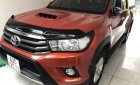 Toyota Hilux   2016 - Cần bán Toyota Hilux đời 2016, màu đỏ xe gia đình, giá 605tr