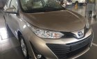 Toyota Vios 1.5E CVT 2018 - Bán xe Toyota Vios 1.5E CVT màu nâu, tăng gói bảo dưỡng 20.000km, hỗ trợ trả góp 90% giá xe. LH: 0912493498