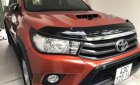 Toyota Hilux   2016 - Cần bán Toyota Hilux đời 2016, màu đỏ xe gia đình, giá 605tr