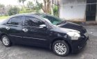 Toyota Vios E 2010 - Cần bán lại xe Toyota Vios E đời 2010, màu đen còn mới, giá 289tr