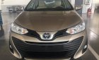 Toyota Vios 1.5E CVT 2018 - Bán xe Toyota Vios 1.5E CVT màu nâu, tăng gói bảo dưỡng 20.000km, hỗ trợ trả góp 90% giá xe. LH: 0912493498