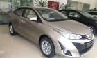 Toyota Vios 1.5 E CVT  2018 - Bán xe Toyota Vios 1.5 E CVT năm 2018, màu vàng