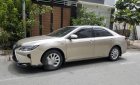 Toyota Camry   2016 - Cần bán gấp Toyota Camry sản xuất năm 2016, màu vàng còn mới giá cạnh tranh