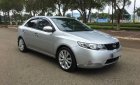 Kia Forte   2010 - Bán ô tô Kia Forte sản xuất năm 2010, màu bạc xe gia đình