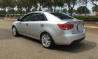 Kia Forte   2010 - Bán ô tô Kia Forte sản xuất năm 2010, màu bạc xe gia đình