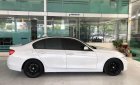 BMW 3 Series 320i 2013 - Cần bán lại xe BMW 320i sản xuất năm 2013, màu trắng, nhập khẩu nguyên chiếc, 888tr