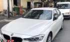 BMW 3 Series 320i 2012 - Bán BMW 320i sản xuất 2012, màu trắng, xe nhập