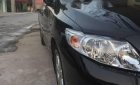 Toyota Corolla altis   2009 - Cần bán Toyota Corolla altis đời 2009, màu đen, số sàn