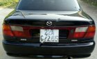Mazda 323 2000 - Bán xe Mazda 323 đời 2000, xe đi làm hàng ngày, máy êm, số ngọt