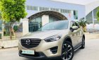 Mazda CX 5 2.0 AT 2016 - Cần bán Mazda CX 5 2.0 AT sản xuất năm 2016, màu vàng như mới