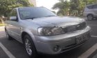 Ford Laser LXi 1.6 MT 2004 - Cần bán gấp Ford Laser LXi 1.6 MT 2004, màu bạc như mới