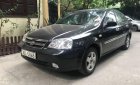 Daewoo Lacetti   1.6 EX  2009 - Cần bán lại xe Daewoo Lacetti 1.6 EX đời 2009, màu đen số sàn, 195tr