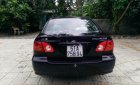 Toyota Corolla altis 1.3 2002 - Cần bán Toyota Corolla altis năm sản xuất 2002, màu đen chính chủ, giá tốt
