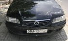 Mazda 626 2002 - Cần bán gấp Mazda 626 đời 2002, màu đen, giá rẻ