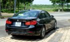 BMW 3 Series 320i 2012 - Bán xe nhà cực mới cực êm 320i, màu đen - 25.000km