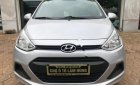 Hyundai i10 1.0MT Base 2014 - Cần bán gấp Hyundai i10 1.0MT Base 2014, màu bạc chính chủ