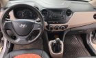 Hyundai i10 1.0MT Base 2014 - Cần bán gấp Hyundai i10 1.0MT Base 2014, màu bạc chính chủ