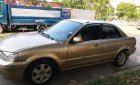 Ford Laser GHIA 1.8 MT 2002 - Cần bán lại xe cũ Ford Laser GHIA 1.8 MT năm 2002