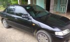 Mazda 323 G 2000 - Bán ô tô Mazda 323 G đời 2000, màu đen, xe còn sử dụng tốt