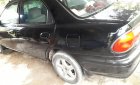 Mazda 323 1999 - Bán xe Mazda 323 SX 1999, màu đen