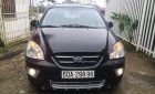 Kia Carens   2010 - Bán Kia Carens đời 2010, màu đen chính chủ, giá 318tr