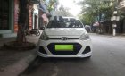 Hyundai Grand i10   2014 - Bán Hyundai Grand i10 sản xuất 2014, màu trắng, 255tr