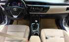 Toyota Corolla altis MT 2015 - Bán ô tô Toyota Corolla altis MT đời 2015, màu bạc số sàn, giá chỉ 592 triệu
