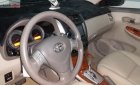 Toyota Corolla altis  2.0 2009 - Cần bán gấp Toyota Corolla Altis 2.0 sản xuất năm 2009, màu đen, bảo hành tại Toyota