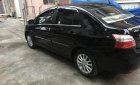 Toyota Vios E 2011 - Bán gấp xe Toyota Vios 1.5E màu sơn đen, sx cuối 2011, chính chủ gia đình sử dụng