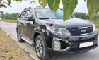 Kia Sorento 2.4L  GAT 2016 - Chính chủ cần tiền bán xe Kia Sorento 2.4L bản GAT sản xuất 2016, màu đen