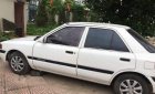 Mazda 323 1996 - Cần bán lại xe Mazda 323 đời 1996, màu trắng, 49tr