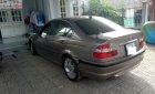 BMW 3 Series 325i 2003 - Cần bán gấp BMW 3 Series 325i đời 2003, màu vàng