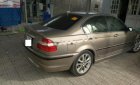 BMW 3 Series 325i 2003 - Cần bán gấp BMW 3 Series 325i đời 2003, màu vàng