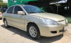 Mitsubishi Galant 1.5 2003 - Bán lại xe Mitsubishi Galant 1.5 2003, màu vàng cát