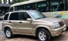 Suzuki Grand vitara  AT 2003 - Cần bán lại xe Suzuki Grand vitara AT năm 2003, màu vàng số tự động