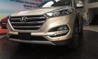 Hyundai Tucson  2.0AT 2018 - Bán ô tô Hyundai Tucson đời 2018, màu vàng giá tốt