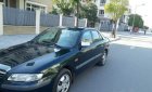 Mazda 626 2004 - Gia đình bán Mazda 626 2004, màu đen, nhập khẩu