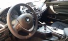 BMW 1 Series 118i 2015 - BMW 118i màu đỏ/đen sản xuất 2015, đăng ký 2016, nhập khẩu Đức, biển Hà Nội