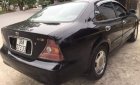 Daewoo Magnus 2004 - Bán xe Daewoo Magnus 2004, màu đen, giá 110tr