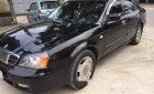 Daewoo Magnus 2004 - Bán xe Daewoo Magnus 2004, màu đen, giá 110tr