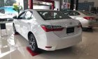 Toyota Corolla altis 1.8 E MT 2018 - Cần bán Toyota Corolla Altis 1.8 E MT sản xuất 2018, màu trắng, xe mới 100%