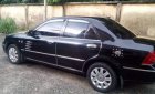 Ford Laser MT 2004 - Cần bán xe Laser, gia đình đi kỹ và bảo dưỡng chÍnh hãng tại Bến Thành Ford