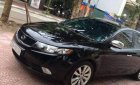 Kia Forte SLi 1.6 AT 2009 - Cần bán lại xe Kia Forte SLi 1.6 AT đời 2009, màu đen, nhập khẩu