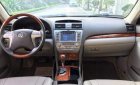 Toyota Camry 2.4G 2009 - Bán Toyota Camry 2.4G đời 2009, màu đen xe gia đình