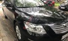 Toyota Camry 2.4G 2009 - Bán ô tô Toyota Camry 2.4G sản xuất năm 2009, màu đen, giá 590tr