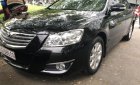 Toyota Camry 2.4G 2009 - Bán ô tô Toyota Camry 2.4G sản xuất năm 2009, màu đen, giá 590tr