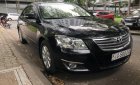 Toyota Camry 2.4G 2009 - Bán ô tô Toyota Camry 2.4G sản xuất năm 2009, màu đen, giá 590tr